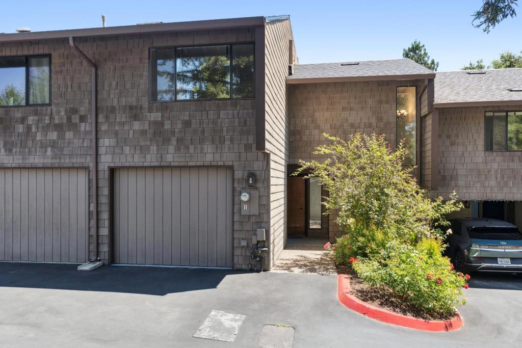 Welcome to this inviting 2-bedroom, 1.5-bathroom home nestled in the desirable community of Scotts Valley. Offering 1,334 sq ft of thoughtfully designed living space, this home combines comfort, efficiency, and charm. The spacious living room boasts vaulted ceilings and a cozy fireplaceideal for relaxing evenings. A mix of marble and carpet flooring adds warmth and elegance throughout. The well-equipped kitchen features a gas oven and range, refrigerator, garbage disposal, and a generous pantry for extra storage. The updated bathroom includes a new shower, head, a separate tub, dual flush toilets, granite countertops, and a brand-new skylight, enhancing both style and natural light. Laundry is simple with a 220V hookup and an in-unit washer/dryer located in the garage. Additional highlights include solar panels with Tesla Powerwall backup, offering energy efficiency and peace of mind. Located in the highly rated Scotts Valley Unified School District, this home is perfect for those seeking quality living in a beautiful setting. Enjoy resort-style amenities with the HOA's solar-heated pool, outdoor cabana with built-in kitchen, spa, and BBQ areaperfect for entertaining or unwinding. A must-see property that combines practical features with a relaxed California lifestyle!