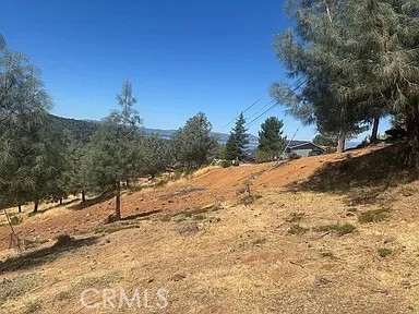 This 0.3-acre lot with a partial lake view is an absolute bargain. seller's loss. buyer's gain. Great chance to purchase equity from the get-go. Utilities at the street make for easy build.