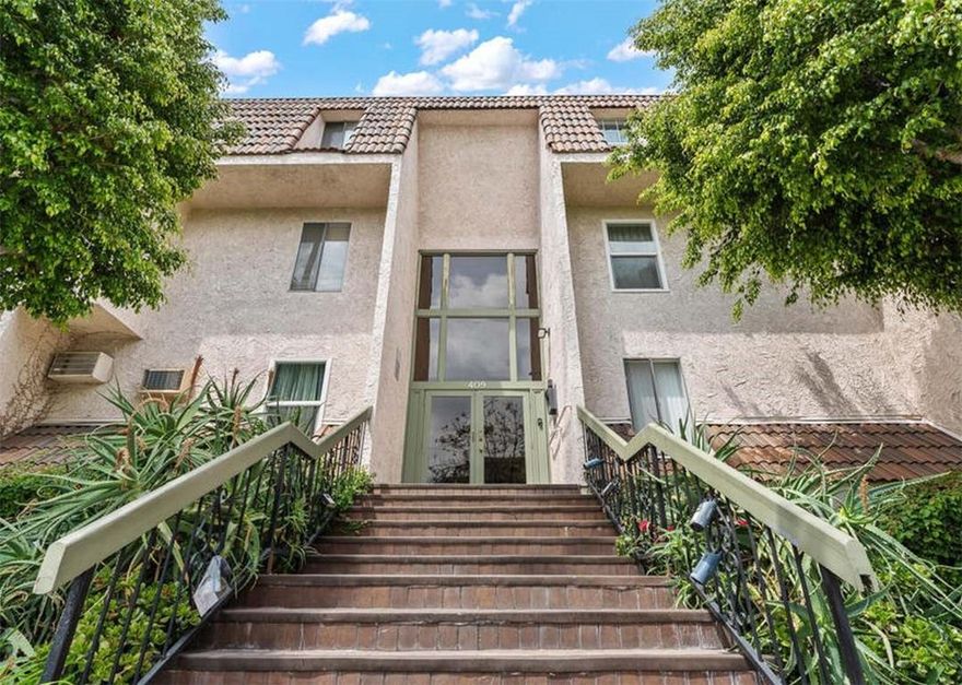 Upgraded gorgeous contemporary top-floor corner/end unit with amazing mountain views & 2 balconies! Bright move-in ready condo located in a desirable Glendale neighborhood, on a tree-lined street, close to trendy Americana, shopping & restaurants with easy access to freeways. The Security building offers 2 side-by-side subterranean parking & a storage closet. You will love the open floor plan with Japanese Shoji doors that open up the space or close for ultimate privacy, newer double door sliding doors with built-in mini blinds open to the balcony, laminated floors throughout, elegant living & dining room with built-in glass door cabinets and recessed lights. There are 2 good-sized bedrooms and 2 full bathrooms. The primary suite features 3 closets, a private hallway, and a bath. The newly remodeled kitchen is nice, featuring quartz countertops, stylish cabinets, and stainless steel appliances, including a new Microwave, which opens to the dining room. Building allows small Pets and offers a beautiful community POOL & spacious decks & sitting areas with tables & chairs.

This elegant condominium is in immaculate condition with several upgrades and could be anyone's ideal HOME!