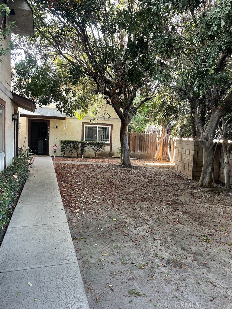 This cozy condominium is located in a very quiet and clean complex. Ready to move in. Two story home feature 3 beds and 2.5 baths. Bright kitchen opens to a spacious family area with a dining area. Private back yard with direct access to two car garage, extra two parking spaces. All three large size bedrooms upstairs. Large master bedroom with a full bath. .5 bath downstairs.