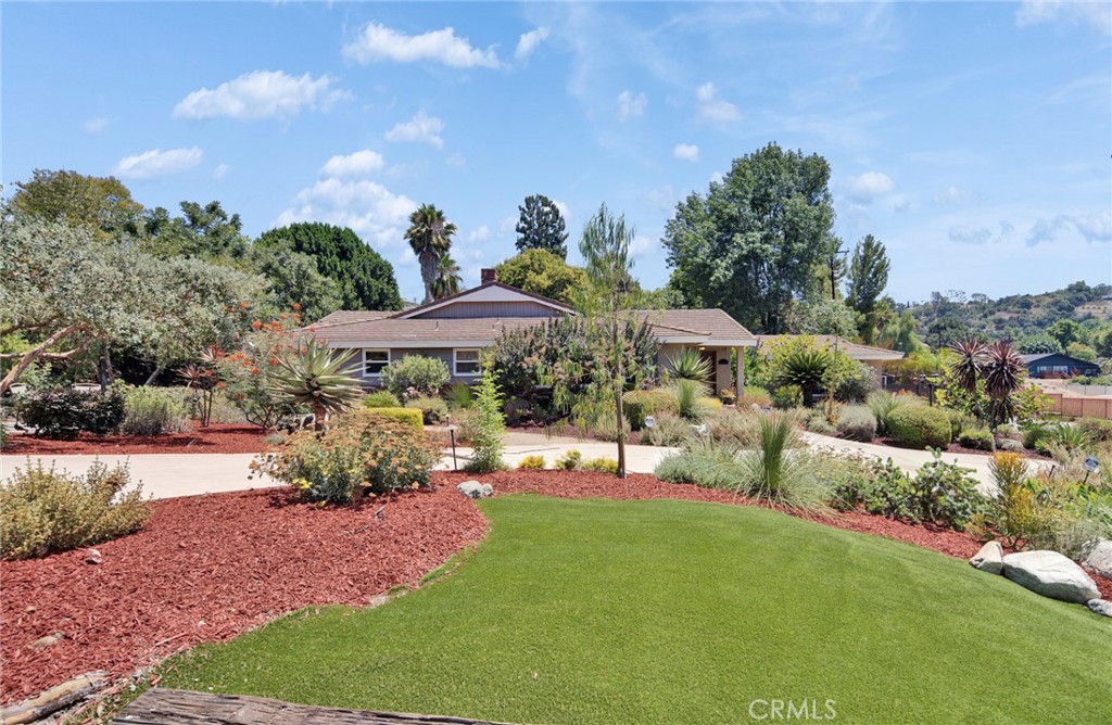 Luxury Single-Level Ranch Estate with Exceptional Custom Upgrades in Covina Hills – South Hills School District
Experience serene, elevated living in this meticulously renovated single-story estate, nestled in the exclusive Covina Hills community. Blending upscale comfort with timeless craftsmanship, this home has been completely reimagined by a discerning owner with an uncompromising eye for detail and quality.
Step inside to discover elegant leathered marble countertops, designer flooring, red brick fireplace and premium finishes throughout—every upgrade thoughtfully selected to elevate the living experience. The expansive open-concept floor plan offers a seamless flow between the living, dining, and entertainment areas, ideal for both everyday comfort and stylish hosting.
Enjoy the best of California living in your private backyard oasis, featuring a resort-style pool and spa, a custom fire pit and professional BBQ island perfectly positioned to take in scenic pool views, and a uniquely elevated gazebo—an ideal spot to unwind with a morning coffee or evening glass of wine. Direct access from the pool area to a conveniently located powder room adds ease and comfort when entertaining outdoors.
This energy-efficient home is equipped with 31 fully paid-off solar panels, keeping electricity bills remarkably low year-round. Additional highlights include an oversized, free-standing storage shed for ample space, and thoughtfully designed drought-tolerant (xeriscape) landscaping that enhances the estate-like ambiance of the property.
An adjacent ~20,000 sq ft flat vacant lot offers tremendous potential—whether for expansion, a guest house, or additional development (buyer to verify).
This is more than a home—it’s a lifestyle of refined tranquility in one of Covina’s most sought-after neighborhoods.