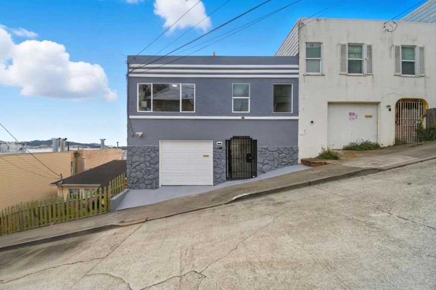 This beautifully updated 3-bedroom, 2-bath residence offers flexibility, space, and comfort across multiple levels  perfect for extended family, guests, or those seeking extra privacy. All with panoramic city views!  The upper level features a bright and spacious layout with two large bedrooms, a refreshed bathroom with a new shower panel, a remodeled kitchen with modern finishes, and an inviting living and dining area that opens to a balcony showcasing stunning city views. Its the ideal setting for everyday living and entertaining. The middle level, accessible through its own private entrance, provides a versatile setup for extended family or guests. It includes a generous living area, a full bath, a wet bar open to a family or media room, and access to the third bedroomwhich impresses with high ceilings and a spacious walk-in closet. This level also enjoys the same sweeping city views, creating a cohesive connection between both floors. Interior stairway and a rear deck with outdoor staircase connect the middle and lower levels, providing easy outdoor access and entertaining options. In the lower level is the third room in this home with high ceiling, walk in closet, and patio.