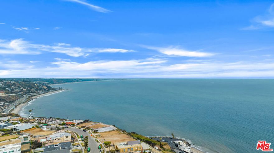 Once the site of a beautiful 2,716 SF residence, featuring ocean, coastline and mountain panoramas, this rare, flat 9,600+ square foot lot now offers a prime opportunity to rebuild your own custom home with sweeping views of the entire Santa Monica Bay. With both the EPA Phase I environmental assessment and Phase II debris removal already complete, this lot is cleared and primed for immediate development. One of the larger lots in the neighborhood, and currently the largest lot offered for sale in this coastal enclave, 3753 Malibu Vista Drive offers a generous canvas with exceptional potential. There's ample room to design a spacious home offering indoor-outdoor flow, with a pool, a flat grassy yard, perfect for entertaining and family fun. Just bring your architect and imagination. Boasting an ideal location just above the breaking waves and minutes from world class amenities and top schools, this this special community offers it's residence the best of both Malibu and Pacific Palisades. Schedule an appointment to experience it for yourself.