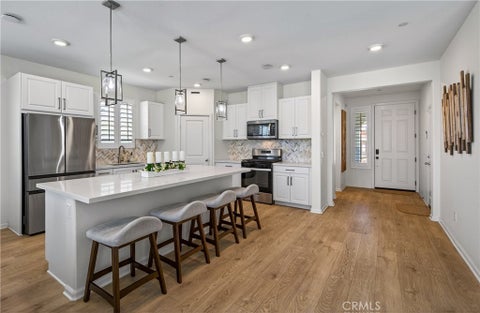 Photo of 7691 Messina Heights LN, Highland, CA 92346 (MLS # IG26182647)