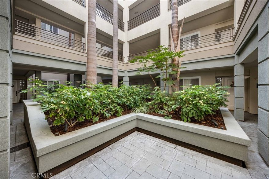 WOW! Luxury condo in fantastic development. Boasting $70K in upgrades.  bright and open single-level home in the conveniently located guard-gated community of the Metropolitan. First-floor location with a private planter offering views of the lush landscaping. Largest floor plan offering a fireplace in the living room, 2 luxury bedrooms with 2 recently remodeled bathrooms, and a spacious kitchen. Community amenities include 24-hour guard security, a gorgeous pool, spa, BBQ area, clubhouse, and fitness center. Convenient transportation, near 405,  John Wayne Arpt, Jamboree Rd. Near UCI hospital, CHOC Center for Children’s Health, and Hoag Urgent Care. Your dream home!