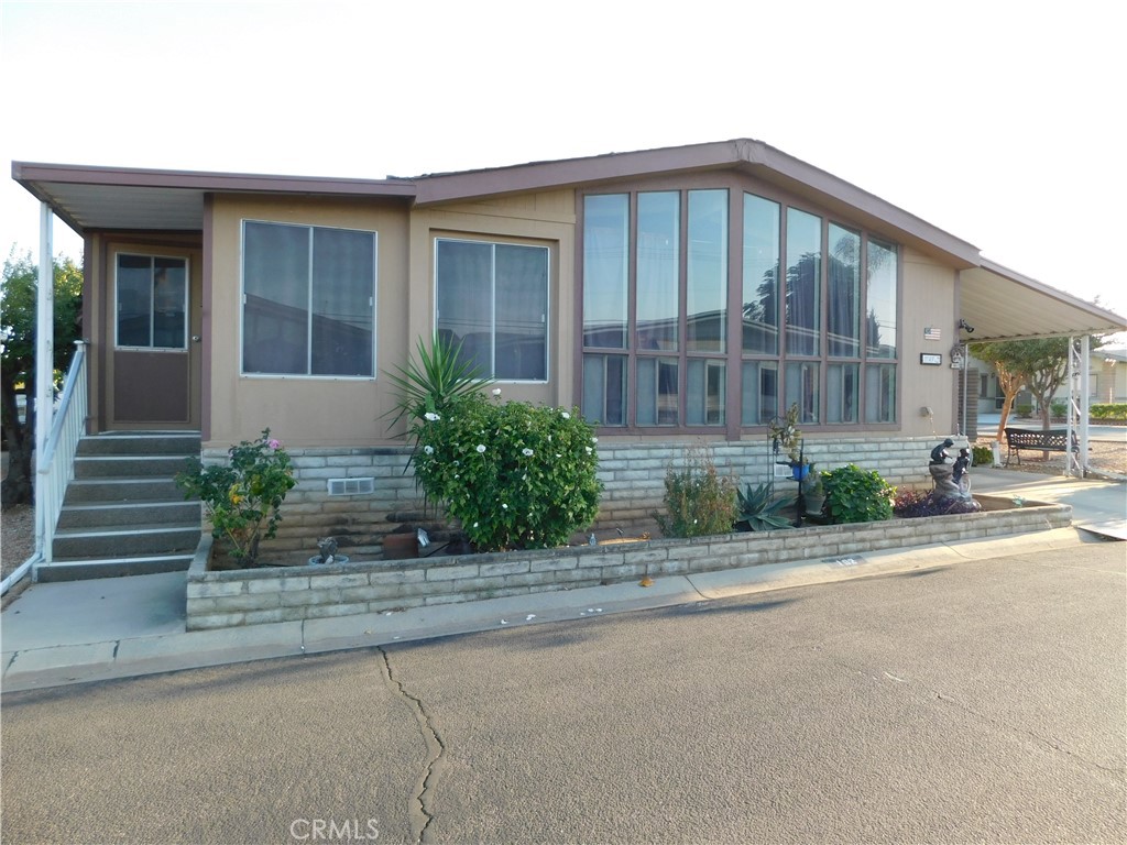 ~EXCEPTIONALLY LARGE TRIPLE WIDE BOASTS 1920 SQFT WITH CURB APPEAL SITUATED ON A CORNER LOT LOCATED IN BANNINGS ALL-AGE GATED COMMUNITY OF LINDA VISTA~UPGRADES INCLUDE ...BRAND NEW FURNACE INSTALLED IN FEB 2025, NEW AC IN JULY 2018, PAINTED INTERIOR IN 2021 PLUS PAINTED EXTERIOR, KITCHEN UPGRADES INCLUDE NEWER COOKTOP, NEWER OVEN AND DISPOSAL REPLACED IN 2022~H U G E BRIGHT LIVING ROOM WITH WALL TO WALL FRONT WINDOWS, CATHEDRAL CEILINGS WITH CEILING FAN~LARGE DINING ROOM WITH BUILT-IN HUTCH~SPRAWLING KITCHEN WITH CABINETS AND COUNTER SPACE GALORE PLUS PASS THROUGH WINDOW~KITCHEN HAS AN EAT-IN DINING ROOM WITH CEILING FAN PLUS A DOUBLE DOOR PANTRY~EXTRA WIDE HALLWAY WITH BUILT-IN DESK AND BOOKSHELVES...PERFECT FOR AN OFFICE AREA~PRIMARY BEDROOM IS KING SIZE PLUS ROOM FOR LARGE DRESSERS AND A SITTING AREA...THE WALK-IN CLOSET IS GIGANTIC ...PLENTY OF ROOM FOR HIS & HERS AND ALL THE EXTRAS~PRIMARY BATHROOM HAS DOUBLE SINKS, LARGE LINEN CABINET, GARDEN TUB, SEPARATE WALK-IN SHOWER WITH ENCLOSURE PLUS A VANITY AREA~2ND BEDROOM IS ALSO KING SIZE~2ND BATH HAS A TUB/SHOWER~SPACIOUS LAUNDRY ROOM WITH BUILT IN DESK, WASHER/DRYER/LAUNDRY ROOM FRIDGE INCLUDED~ENCLOSED FRONT PORCH FOR AN EXTRA LITTLE BONUS ROOM PERFECT FOR A HOBBY ROOM OR READING NOOK~OVERSIZED SHED/WORKSHOP~2-3 VEHICLE CARPORT~***CALL FOR A TOUR***
~~Park Amenities include: clubhouse with kitchen, library, and bathrooms, pool/jacuzzi, pool tables, table tennis, outdoor tennis/pickleball courts, grills, outdoor seating with refreshing views, outdoor firepit, grassy area for dogs, and more!~~