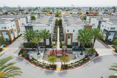 Photo of 14428 Papaya Ln #3, Gardena, CA 90247 (MLS # TR26070879)