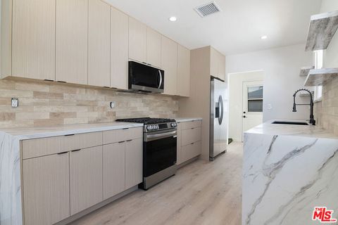 Photo of 17638 Welby Way, Van Nuys, CA 91406 (MLS # 26828929)