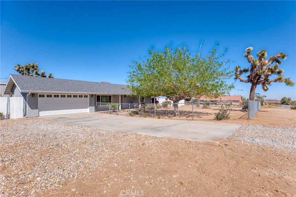 Photo of 58780 Buena Vista Dr, Yucca Valley, CA 92284 (MLS # JT26063844)