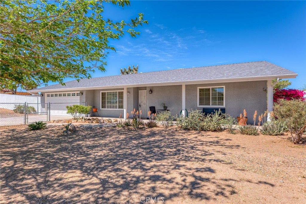 Photo of 58780 Buena Vista Dr, Yucca Valley, CA 92284 (MLS # JT26063844)