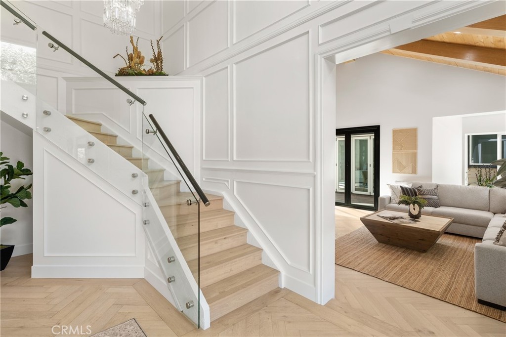 NEW to the market — a stunning, fully remodeled luxury estate in the heart of Yorba Linda’s coveted land of gracious living. This exquisite custom-designed home offers nearly 2,874 sq ft in the main residence, complemented by a sleek 650 sq ft Accessory Dwelling Unit (ADU), totaling approximately 3,525 sq ft of sophisticated living space.
Step inside to discover five beautifully appointed bedrooms and five luxurious bathrooms, all accented with designer touches throughout. One of the bedrooms is currently being used as a stylish office, providing versatile space for work or relaxation. Every countertop is crafted from hand-picked stone, adding a touch of elegance and durability. The interior boasts pristine white oak hardwood flooring and fresh paint throughout, creating a bright, welcoming atmosphere.
This smart home is equipped with integrated technology to control lights and automatic window coverings, offering convenience and modern comfort at your fingertips. It also features 31 paid-off solar panels and two battery packs with a 24-year warranty, ensuring energy efficiency and sustainability for years to come.
Enjoy your own private retreat with a custom pool and spa, ready for summer fun and relaxation. Perfectly positioned just a short stroll to the Yorba Linda Country Club and a quick golf cart ride to the Paxton Horse Arena, this home offers unmatched convenience and lifestyle. Whether entertaining guests or enjoying quiet family evenings, this property seamlessly combines prime location, refined style, and effortless elegance.
— this is high-end living at its finest.
***One of the bedrooms is being used as a office
