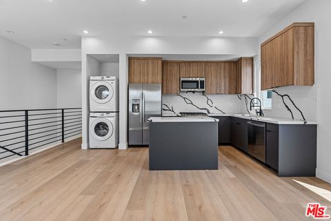 Photo of 4714 W 17th Street, Los Angeles, CA 90019 (MLS # 25620363)