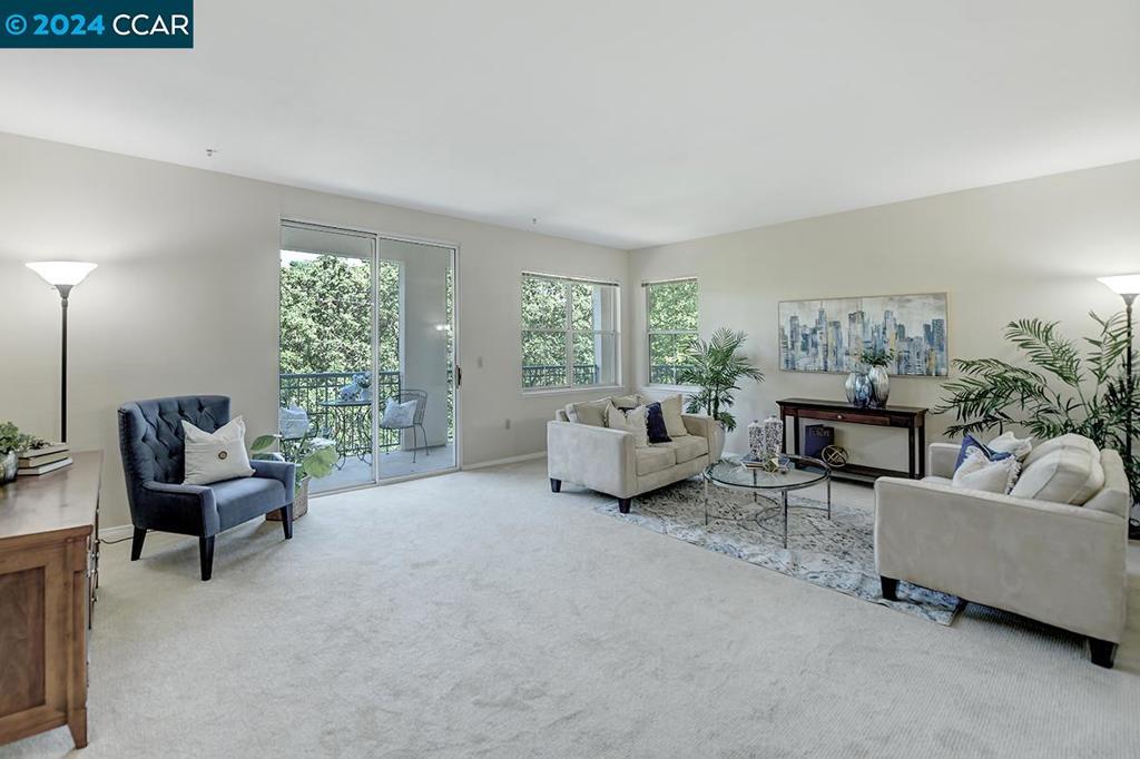 Exclusive Huntington design at The Waterford. Offering 2 bedrooms and 1.5 baths spanning 1237 square feet. Enjoy picturesque sylvan vistas from every angle. Positioned to the east for optimal exposure. The kitchen comes fully equipped. The expansive living room features a sliding door leading to a generous wrap-around balcony. The guest bedroom or den is flooded with natural light. The primary suite boasts ample space, a walk-in closet, and a stall shower. The guest bathroom includes an additional closet and a stacked washer/dryer. Benefit from a newer HVAC system. Additional storage space conveniently located down the hall. Plus, secure underground garage parking. Experience exceptional living at The Waterford. Don't miss out on this opportunity!