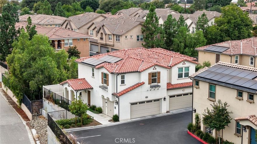 *PAID OFF solar panels* Luxurious 2023 End-Unit Townhome in the Heart of Simi Valley. Tucked away in a quiet, end-of-community location, this stunning 2023-built modern townhome offers the perfect blend of luxury and privacy. As a rare end-unit, it boasts open views, minimal shared walls, and close proximity to a serene park and walking path, all while being just minutes from the best of Simi Valley. Step inside to soaring ceilings, luxury vinyl plank flooring, and a bright open floor plan designed for modern living. The upgraded kitchen is a chef’s dream, featuring sleek quartz countertops, white cabinetry, and stainless steel appliances. The spacious living room is framed by custom shutters, picture-perfect windows, and a stylish ceiling fan, seamlessly connecting to the dining area and the expansive private backyard and side yard. Downstairs also includes a convenient powder room and direct access to a 2-car garage. Upstairs, you'll find three generously sized bedrooms. The primary suite is a true retreat, offering a spa-like bath with a large walk-in shower, dual vanities, and a spacious walk-in closet. A separate laundry room upstairs adds everyday convenience. Additional highlights include: Tankless water heater, HVAC, and furnace – all just 2 years old. With its prime location, high-end upgrades, and attention to detail, this move-in-ready townhome is a rare opportunity in today’s market. Don’t miss your chance to own this exceptional property in one of Simi Valley’s most desirable communities!