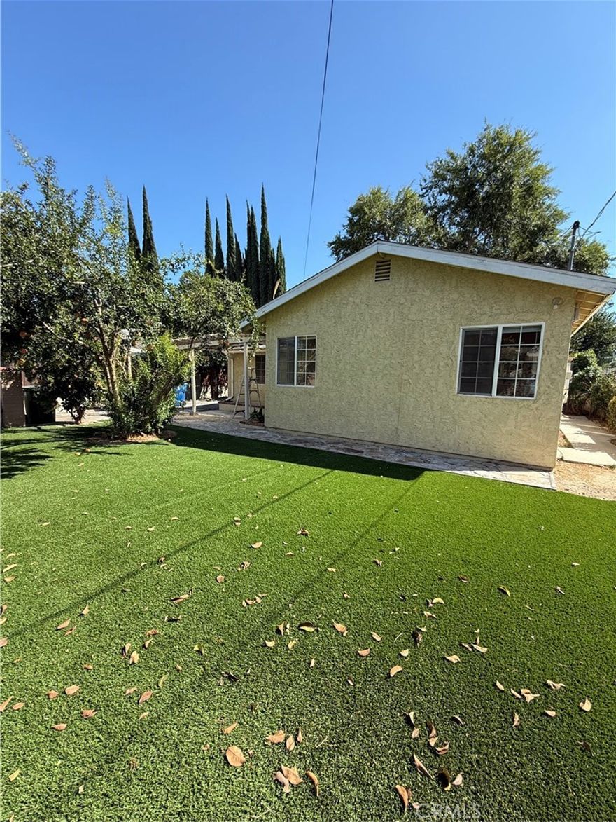 Beautifully updated 2-bedroom, 2-bath home with a bonus room in a desirable part of Reseda. The home features an open kitchen with new cabinets, countertops, and vanities, plus an in-unit washer and dryer. Freshly painted throughout with low-maintenance turf landscaping, a gated front entry, and a relaxing outdoor space with shade and fruit trees.The back ADU is rented separately and fully fenced off, ensuring privacy for this home. Gardener service is included and maintained weekly by the landlord.Optional: Landlord is willing to include all utilities for a set monthly fee on top of rent.

Close to shopping, dining, and major streets, this rental offers comfort, convenience, and a touch of nature.