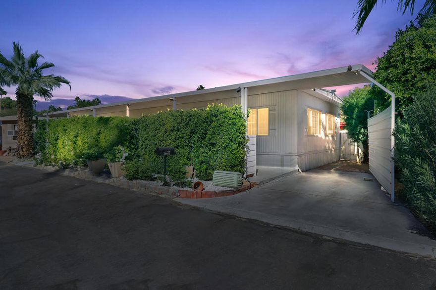 Ready for Palm Springs lifestyle? this is it! This beautiful home has so much to offer, such as an open kitchen/living room floor plan perfect for your entertainment.Kitchen features long island with white quartz, stainless steel appliances including the refrigerator, washer and dryer. Upgraded plumbing, air conditioning, windows, laminated floors, paint, plenty of storage. Walking distance to popular hiking trails, restaurants and shopping places just near by. Monthly park lease is $830 buyers to be approved by the park. HOA includes pool/spa, club house for your parties, library and much more!