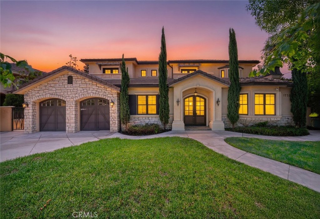 Nestled in the prestigious Highland Oaks neighborhood, this exceptional residence offers an elegant blend of timeless design, luxurious finishes, and an unbeatable location near award-winning Arcadia schools. Situated on an expansive 10,358 sq ft lot with captivating mountain views, the home showcases exquisite craftsmanship and thoughtful attention to detail throughout.
A grand double-door entry welcomes you into soaring two-story ceilings and gleaming marble floors, setting the tone for the refined living spaces beyond. The flowing floor plan spans 4,437 sq ft and includes a gracious formal living room with fireplace, a stately library/office, a formal dining room ideal for entertaining, and a spacious family room overlooking the serene backyard.
The gourmet kitchen is a chef’s dream, complete with top-tier appliances, custom cabinetry, granite countertops, and a separate wok kitchen. Travertine and wood flooring add warmth and sophistication throughout the home.
Four generously sized en suite bedrooms provide comfort and privacy, each designed with abundant natural light and refined finishes. Additional features include a digital intercom system and custom built-ins.
The outdoor area is equally impressive, offering a concrete patio perfect for al fresco dining and gatherings. This remarkable property is a rare opportunity to own a beautifully maintained home in one of Arcadia’s most sought-after communities.