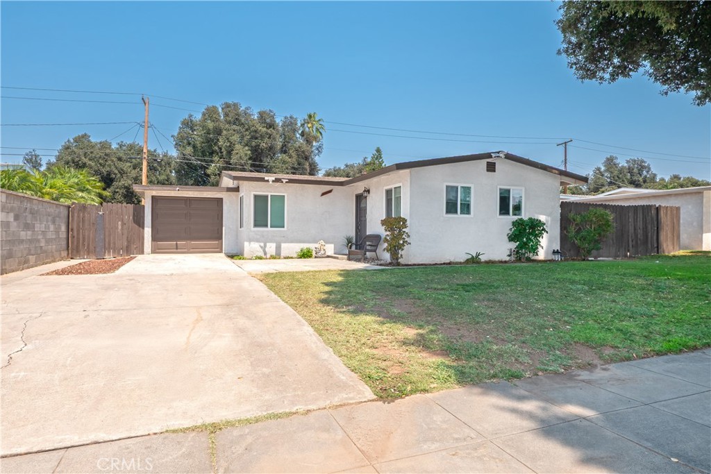 Welcome to 3893 Overland, a charming single-story home offering modern comfort in the heart of Riverside. This thoughtfully upgraded 1,466 sq ft property sits on a spacious 6,970 sq ft lot and features RV parking, granite countertops, and open space in both the front and back yards. The main house includes 2 bedrooms and 1 bathroom, plus a small room with 1 bedroom and 1 bathroom — perfect for guests, extended family, or rental potential. Located on a quiet street within a welcoming neighborhood, the community offers easy access to schools, shopping, and healthcare facilities.