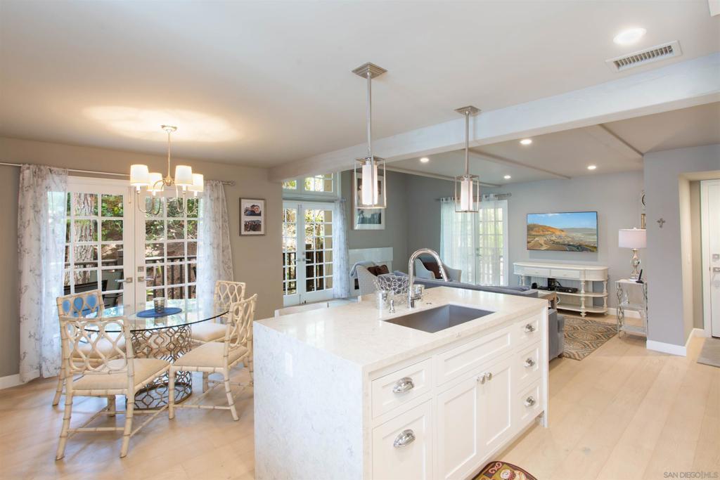 Simply spectacular 2 bed/2.5 bath property in the highly sought after Villas Majorca complex.This beautiful townhome has recently undergone a full interior remodel and no expense was spared.White Oak hardwood flooring and premium carpeting throughout.The Chef's kitchen features a waterfall granite island,custom cabinets including a paneled refrigerator and high end stainless appliances.Both bathrooms are classic with granite vanities,glass and tile enclosures with top quality fixtures including Toto toilets.Open up the large French doors to the spacious deck off the main living area surrounded by lush and mature trees/plants.Entertain,enjoy your morning coffee or just relax. Close to 5 fwy access and UCSD Campus. A short stroll across the road to Whole Foods,Trader Joes,Ralphs,Banks,Retails Stores,Urban Plates and CVS Pharmacy.This location has it all! Take advantage of the private community pool area or maybe a game of tennis on either of the two courts. Sewer: Sewer Connected Topography: LL