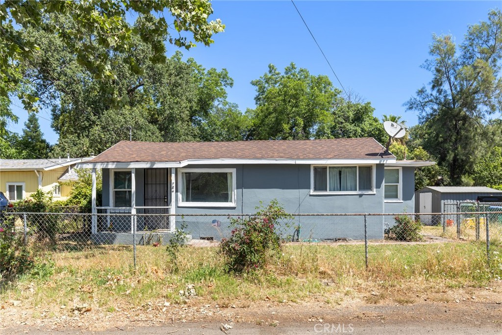 Cute house on a large lot ! Recently hooked up to City Sewer and has a new mini split, new carpet and shows neat as a pin !!! Why rent when you could own this Chico charmer on a large lot backing up to an alley!! Newer Roof, Fiberoptic Internet, refrigerator included !! City Retrofit is on file