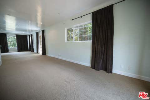 Tiny photo for 503 N Greencraig Road, Los Angeles, CA 90049 (MLS # 26688219)