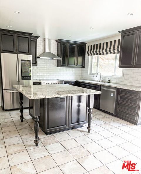 Tiny photo for 503 N Greencraig Road, Los Angeles, CA 90049 (MLS # 26688219)