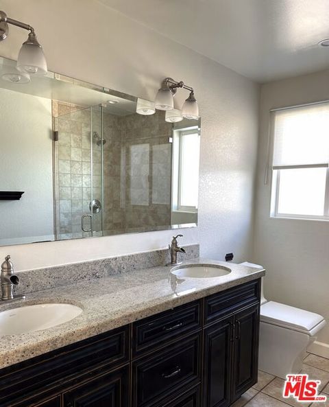 Tiny photo for 503 N Greencraig Road, Los Angeles, CA 90049 (MLS # 26688219)