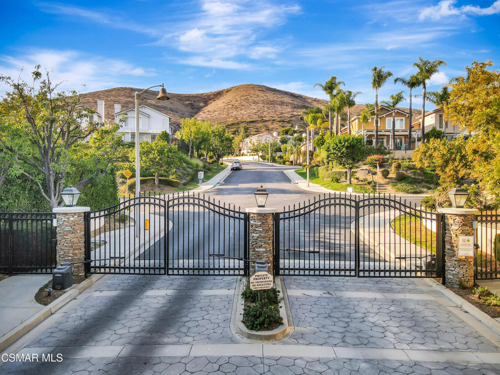 Welcome to 3044 Ferncrest Place--a beautifully upgraded 4-bedroom, 3-bath home tucked away on a cul-de-sac in the sought-after gated Eagle Ridge community of Lang Ranch. With its light-filled living space and breathtaking views of the North Ranch Open Space, this residence offers the perfect balance of luxury and everyday comfort.From the moment you enter, you're greeted by a thoughtfully designed floor plan where custom hardwood floors, plantation shutters, and recessed LED lighting set the tone for elegance. The family room invites you to relax with its beautiful stone fireplace, custom built-ins, and integrated surround sound--perfect for cozy nights or lively gatherings.The renovated kitchen is a chef's delight, featuring custom wood cabinetry, quartzite countertops and backsplash, undermount lighting, convection oven and microwave, a trash compactor, and an oversized center island that makes entertaining a joy.Upstairs, the primary suite feels like a private retreat, complete with built-in surround sound, a dual-sided marble fireplace, and custom cabinetry. The spa-style bathroom is a showstopper with in-floor heating, an extra-large soaking tub, marble finishes, custom vanity and mirrors, and a fully built-out walk-in closet with thoughtful details like an integrated ironing board, hamper, and jewelry drawer. Two additional bedrooms with closet organizers are served by a beautifully appointed marble bathroom, while a versatile flex room features a built-in desk system and ample space to function as a home office, media lounge, or playroom.Downstairs, a bedroom and full bath provide an ideal setup for guests or multi-generational living. The laundry room is as functional as it is stylish, featuring a stone countertop, utility sink with a Multi-Pure water filter system for bottle filling, and a folding counter above the washer and dryer.The home's exterior is equally impressive, boasting a brand-new roof (2024), landscape lighting in the front and backyards, low-maintenance turf, irrigation, fruit trees, and a tranquil water fountain. The garage offers built-in cabinetry, snap lock flooring, overhead shelving storage, and a bike pulley system--perfect for the outdoor enthusiast.This home has been thoughtfully maintained with principles of flow and balance in mind, enhancing both comfort and harmony. Be sure to review the highlight list, as the owners have incorporated numerous custom features and upgrades--from fine finishes to practical details--that make this home truly one of a kind.As part of the Eagle Ridge community, residents enjoy resort-style amenities including a pool, spa, and park, all within a secure, gated neighborhood just minutes from top-rated schools, trails, and local conveniences.