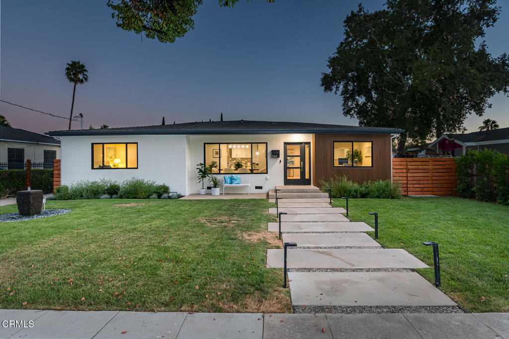This luxurious modern ranch has been expanded and completely renovated down to the studs, offering 2,295 sq. ft. of thoughtfully designed living space plus a newly built 492 sq. ft. finished garage. Virtually everything is brand new, including the roof, HVAC, plumbing, electrical, dual-pane windows, wide-plank engineered wood floors, tankless water heater, automatic sprinkler system, and professionally landscaped grounds. The result is a home that delivers the quality and confidence of near ground-up construction while preserving timeless Pasadena character.A landscaped front yard with a floating stone path leads to the entry framed by picture windows. Inside, the home opens into a spacious great room filled with natural light and wide-plank floors. This expansive space blends an inviting living area, perfect for entertaining, with a chef's kitchen anchored by a striking waterfall island, Thermador appliances, pot filler, custom cabinetry, and a contemporary tile backsplash. The adjacent dining room is framed by large windows that overlook the manicured front lawn, creating a refined setting for gatherings both large and small.Just off the entry, a versatile office or bedroom enjoys its own views of the front lawn. From the great room, a central hallway leads to the private wing. Along the way, a powder room serves guests, while two junior bedroom suites each include their own well-appointed private bath. At the end of the hall, the south-facing exquisite primary suite feels like a private sanctuary with a walk-in closet, sitting area, and sliding doors to a brand-new deck. The spa-inspired bath features dual vanities, an oversized shower with frameless glass, and a soaking tub.The backyard is equally impressive, with a deck extending the living space, new landscaping, and side gates for access. A custom automatic gate and fence open from the rear street to the newly built garage, complete with paneled door, updated lighting, and a Tesla universal charger. With plenty of room for a potential ADU, the property also offers flexibility for future expansion.Minutes from the Rose Bowl, Brookside Golf Course, Old Town Pasadena, and an array of parks, shops, and dining, this fully renovated and expanded home blends modern design, timeless comfort, and an unmatched Pasadena location.