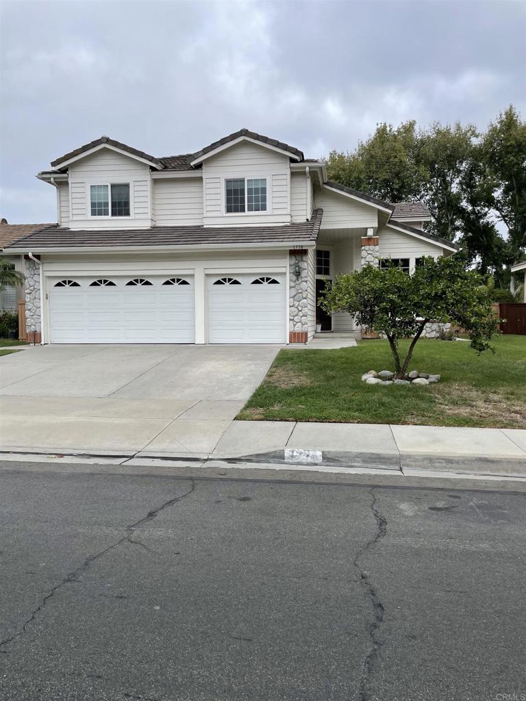 Enjoy this detached house located in the highly sought out Encinitas community, close to beach , shops and restaurants. As you step inside the home you are welcomed by light and bright entry with high ceilings. One full bedroom and bath on main floor. three garages, fire place in to family room. Laundry Room with Full size Washer and Dryer. House is ready move in. Landscape is in progress . A must see.