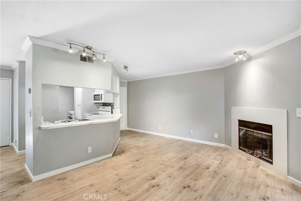 Welcome to this beautifully updated 2-bedroom, 2-bathroom condo located in the highly desirable Borgata gated community. 1,008 sq. ft. of comfortable living space, this first-floor unit combines modern upgrades with resort-style amenities.
Inside, you’ll find brand-new waterproof Pergo flooring throughout and a stylish quartz countertop kitchen complete with ample cabinetry, a double sink, and upgraded appliances. The open floor plan flows seamlessly into the spacious living area, which features a cozy fireplace and a large sliding glass door leading to your private covered patio—perfect for relaxing or entertaining. The home also includes the convenience of in-unit laundry, mirrored closet doors in the bedrooms, and central heating and air conditioning for year-round comfort. To top it off, the property comes with two assigned parking spaces, one covered carport and one uncovered.
Life at Borgata means enjoying exceptional community amenities such as three sparkling swimming pools, a spa, a tennis court, a clubhouse, multiple BBQ areas, and beautifully landscaped greenbelts with serene creeks. The HOA fee covers water, trash, sewer, and landscaping, leaving only electricity to manage.
This condo is ideally located within the highly rated Etiwanda School District and just minutes away from popular shopping and dining destinations including Victoria Gardens, Terra Vista Town Center, and Ontario Mills Mall. With easy freeway access, commuting and exploring all that Rancho Cucamonga has to offer is simple and convenient.
This home truly offers the perfect blend of comfort, convenience, and community living