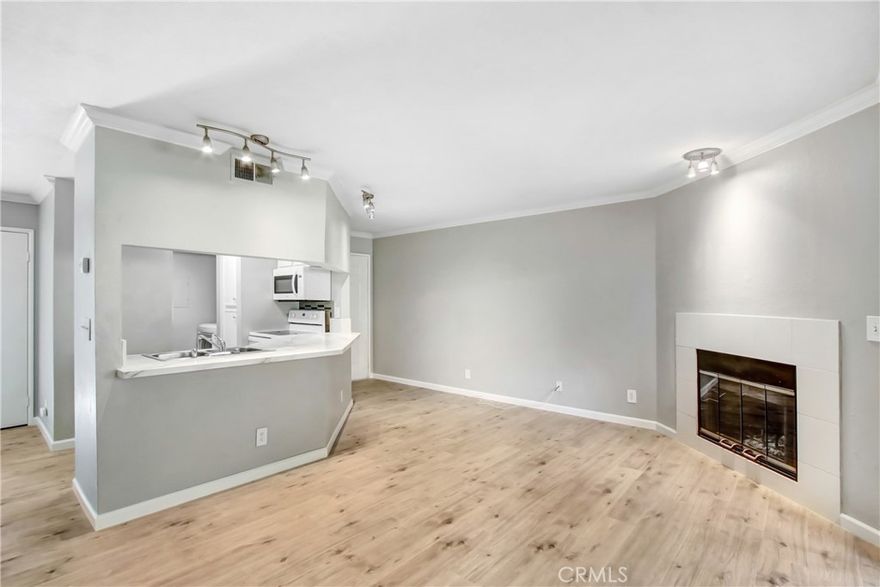 Welcome to this beautifully updated 2-bedroom, 2-bathroom condo located in the highly desirable Borgata gated community. 1,008 sq. ft. of comfortable living space, this first-floor unit combines modern upgrades with resort-style amenities.



Inside, you’ll find brand-new waterproof Pergo flooring throughout and a stylish quartz countertop kitchen complete with ample cabinetry, a double sink, and upgraded appliances. The open floor plan flows seamlessly into the spacious living area, which features a cozy fireplace and a large sliding glass door leading to your private covered patio—perfect for relaxing or entertaining. The home also includes the convenience of in-unit laundry, mirrored closet doors in the bedrooms, and central heating and air conditioning for year-round comfort. To top it off, the property comes with two assigned parking spaces, one covered carport and one uncovered.



Life at Borgata means enjoying exceptional community amenities such as three sparkling swimming pools, a spa, a tennis court, a clubhouse, multiple BBQ areas, and beautifully landscaped greenbelts with serene creeks. The HOA fee covers water, trash, sewer, and landscaping, leaving only electricity to manage.



This condo is ideally located within the highly rated Etiwanda School District and just minutes away from popular shopping and dining destinations including Victoria Gardens, Terra Vista Town Center, and Ontario Mills Mall. With easy freeway access, commuting and exploring all that Rancho Cucamonga has to offer is simple and convenient.



This home truly offers the perfect blend of comfort, convenience, and community living