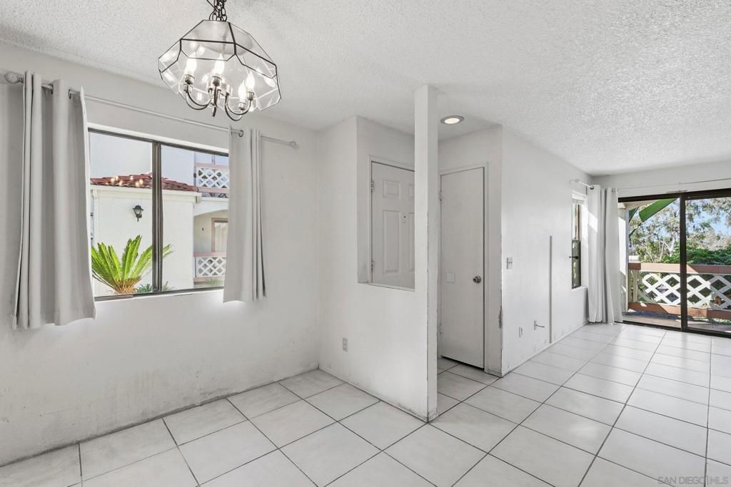 Photo of 9454 Twin Trails Dr Dr #103, San Diego, CA 92129 (MLS # 260002809SD)