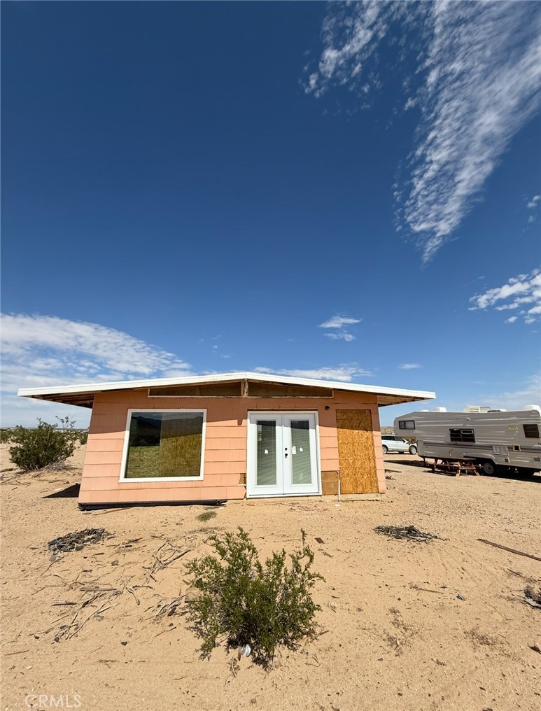 GREAT INVESTOR OPPORTUNITY! This recreational cabin offers a head start on your dream getaway or investment project.  The seller began a thoughtful renovation, adding 2 bedrooms and 2 bathrooms, along with new windows, exterior door, and a brand new roof. Framing is complete, giving you a solid foundation to finish the interior to your liking.
The seller is unable to complete the project, so it's being sold AS-IS, creating an excellent opportunity for investors, contractors, or DIY buyers looking for sweat equity.  
An RV is also included, with power and water connected, to provide a temporary living space, or guest use when build is complete.
Bring your vision and finishing touches to transform this promising structure into a functional cabin, vacation spot, or future rental. Don't miss this rare value-add property with major work done already!
Water connected.
Appraisal of finished house is $360k.
Seller willing to possibly carry with down payment.