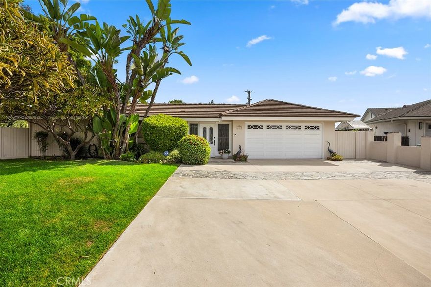 Welcome to this executive level, single story ranch style home. It is situated at the end of a quiet cul-de-sac in a neighborhood that reflects true pride of ownership. Located within the highly desirable Fullerton school district, this 4 bedroom, 2.5 bath home offers nearly 2,000 sq. ft. of comfortable and welcoming living space. It is the definition of a true “gathering place.” Upon entry, you are greeted by a lush courtyard, an inviting sanctuary where you can sip your morning coffee or unwind with a glass of wine at the end of the day. Double doors welcome you to a bright living room. This living room features a cozy fireplace and flows seamlessly into a versatile den, providing plenty of room for family and friends. A large picture window in the living room beckons you to the beautiful backyard. The backyard is truly an entertainer’s and gardener’s dream. It shines with a gated sparkling pool, grassy areas, hot tub and inviting firepit. Enjoy al fresco dining by the pool or unforgettable evenings under the stars. The expansive nearly 19,000 sq. ft. lot offers endless opportunities for gatherings, gardening and possibly an ADU. From the firepit take in magical views of the Disneyland fireworks, a unique touch that makes this home truly special. A new HVAC system ensures year round comfort. Other upgrades include new e-piping throughout. Fullerton itself is a hidden gem in Orange County, where college-town energy meets hometown charm. Known as the “Education Community," it offers highly rated schools such as Sunny Hills H.S., Troy High School and prestigious institutions such as Fullerton College, Cal State Fullerton, Hope University, and Marshall B. Ketchum University. Centrally located between Los Angeles and South Orange County, Fullerton is centrally located between LAX or John Wayne airport. This classic home offers all the benefits of homeownership in a vibrant, sought after location. A wonderful home; truly a must-see! Make your appointment to view this home today!