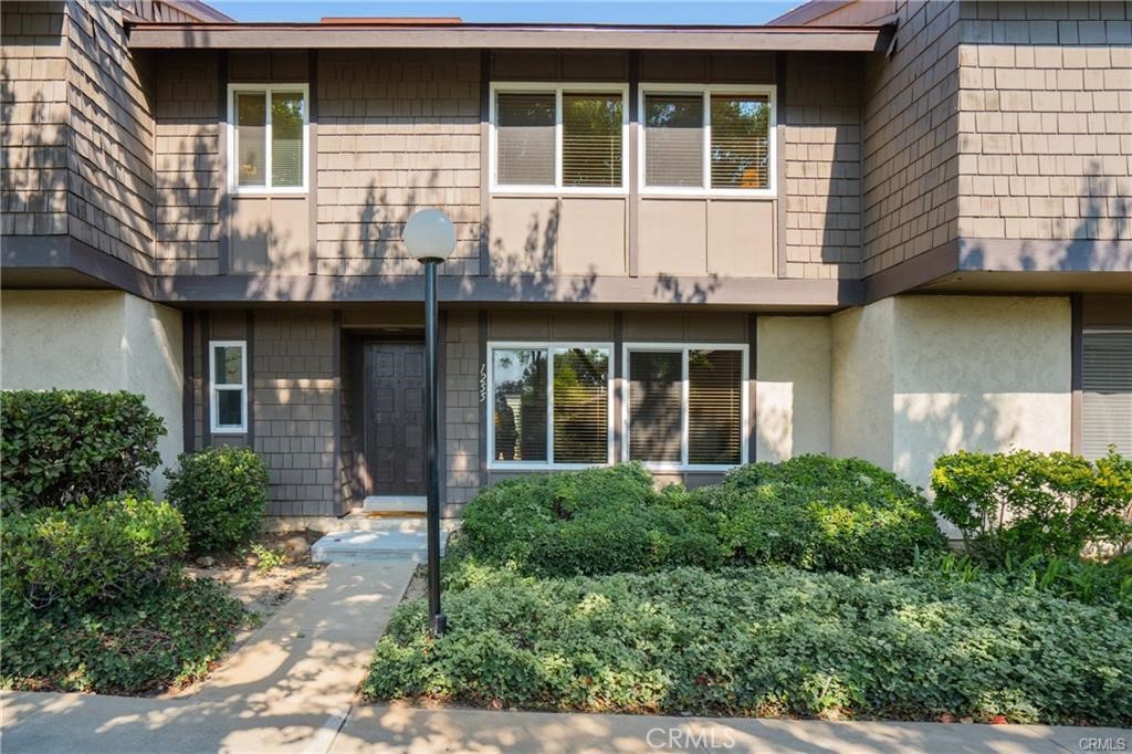 First time on market for rent, in a picture like community with beautiful views, this beautifully maintained 3-bedroom, 2.5-bathroom townhome in one of San Dimas’ most desirable neighborhoods is very hard to find. With a spacious layout, lots of updates, access to community amenities, and the best schools around the area, this home offers both comfort and convenience. Step inside to an inviting living room showcases plenty of natural light, creating a warm and welcoming space to relax or entertain. The highly updated kitchen features ample cabinetry, a pantry, range & hood, built-in dishwasher, and granite counters, opening directly to a large dining area—perfect for family meals or gatherings with friends. Upstairs, you’ll find three generously sized bedrooms, including a primary suite with its own full bathroom. With 2.5 bathrooms total, the layout ensures convenience and privacy for everyone. Additional features include central air and heat, double-pane windows, laundry hookups in the garage, electric car charger and a detached two-car garage for secure parking and storage. In between the kitchen and detached garage, there is a big versatile space ideal for outdoor dining, barbecues, or simply enjoying the California weather in a peaceful setting. The well-kept community offers a sparkling pool, relaxing spa, and landscaped common areas, tennis court, enhancing the lifestyle this home provides. Situated in a quiet neighborhood within the Glendora Unified School District, this property is just minutes from parks, shopping, dining, and freeway access. Move-in ready and full of charm, 1255 Meadow Glen Lane is the perfect blend of style, function, and location.