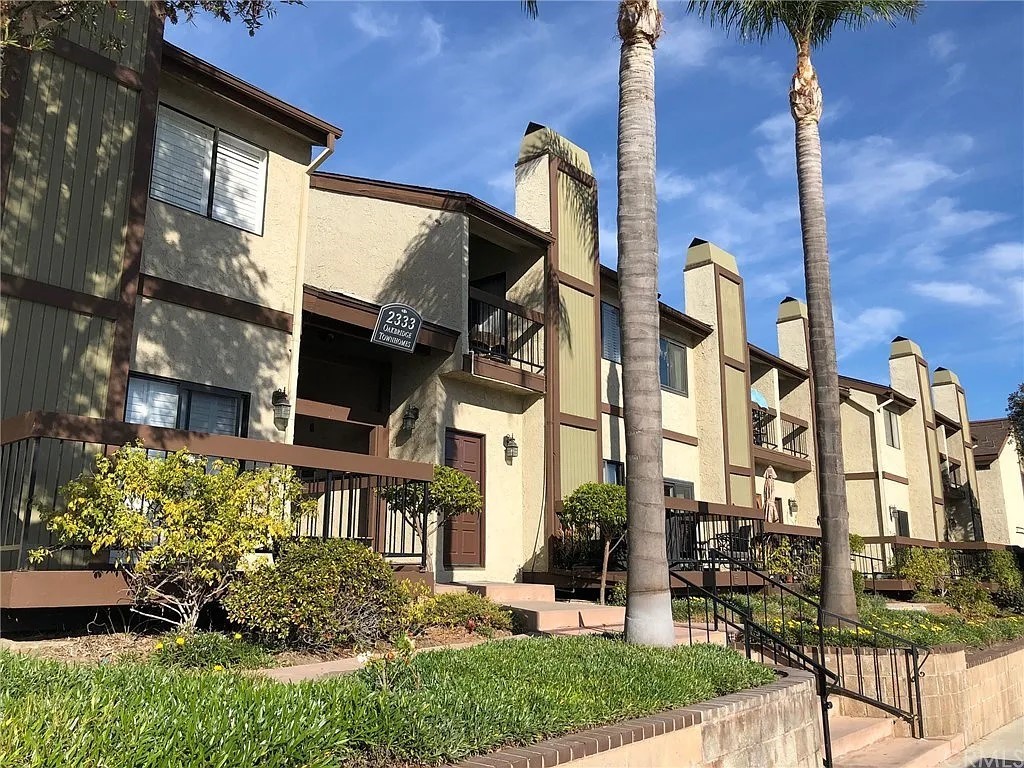 Centrally located townhome in a quiet neighborhood in Lomita. Large primary suite with vaulted ceilings, fireplace and beautiful views of the Palos Verdes Hill from the balcony. Includes granite counters, breakfast bar, dishwasher, gas stove and plenty of kitchen storage. In addition this home has an over-abundance of storage throughout the home. Enjoy the easy to operate fireplace and the large balcony off of the living room with spectacular views. Washer and Dryer are included and located at the lower level of the townhome. Enjoy the community pool, spa and BBQ which are just steps from the unit. Near Torrance crossroads shopping center and downtown Lomita with its restaurants and breweries!! No pets allowed.