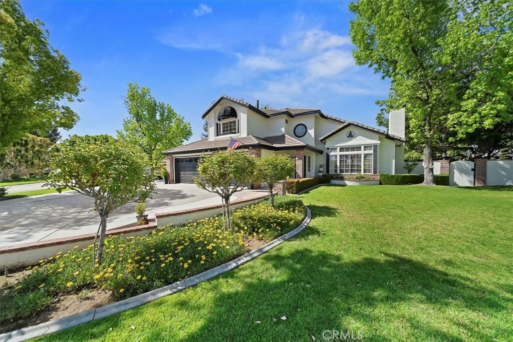 Alessandro Heights – Your Dream Lifestyle Starts Here!
Welcome to a showstopper! This absolutely stunning 4-bedroom, 3-bath semi-custom beauty sits on a sprawling ½-acre lot at the end of a quiet cul-de-sac in the highly sought-after Alessandro Heights neighborhood—complete with breathtaking city light views and no rear neighbors!
From the moment you pull up, the picture-perfect curb appeal will have your heart racing. Step inside and prepare to be WOWED by over 2,550 square feet of sophisticated yet comfortable living. Gorgeous travertine floors, soaring ceilings, and custom touches throughout make this home one-of-a-kind.
The formal living room is bathed in natural light with real hardwood floors, a classic wood-burning fireplace, and vaulted ceilings that add an extra touch of drama. The spacious family room offers built-in cabinetry, a cozy fireplace, and charming window seats—plus direct access to the incredible backyard.
Calling all chefs and entertainers: the gourmet kitchen is a dream! Featuring granite countertops, custom cabinetry, center island with sink and breakfast bar, high-end appliances (yes, including a wine fridge), and an abundance of natural light—it’s ready for every gathering.
Off the kitchen, enjoy both a vaulted formal dining area and a casual breakfast nook with backyard views. Need a downstairs bedroom? You’ve got it—along with a beautifully upgraded full bath and spacious laundry room with direct yard access.
Head upstairs to your massive master suite with vaulted ceilings, plantation shutters, and tons of closet space. The en-suite bath is pure luxury, with a soaking tub, oversized shower, dual sinks, stone countertops, and loads of cabinet space.
And the backyard? An absolute paradise. Imagine an English garden meets adventure playground—with lush landscaping, Mature trees, three covered patios, a peaceful fountain, zipline, and an incredible treehouse that’s just as perfect for grownups as it is for kids!
There’s also gated RV parking, a huge storage shed, 3-car garage with upgraded doors and openers, and plenty of space for all your toys.
Homes like this don’t come along often. Check out the photos, watch the virtual tour, and schedule your private showing TODAY. You’re going to fall in love.