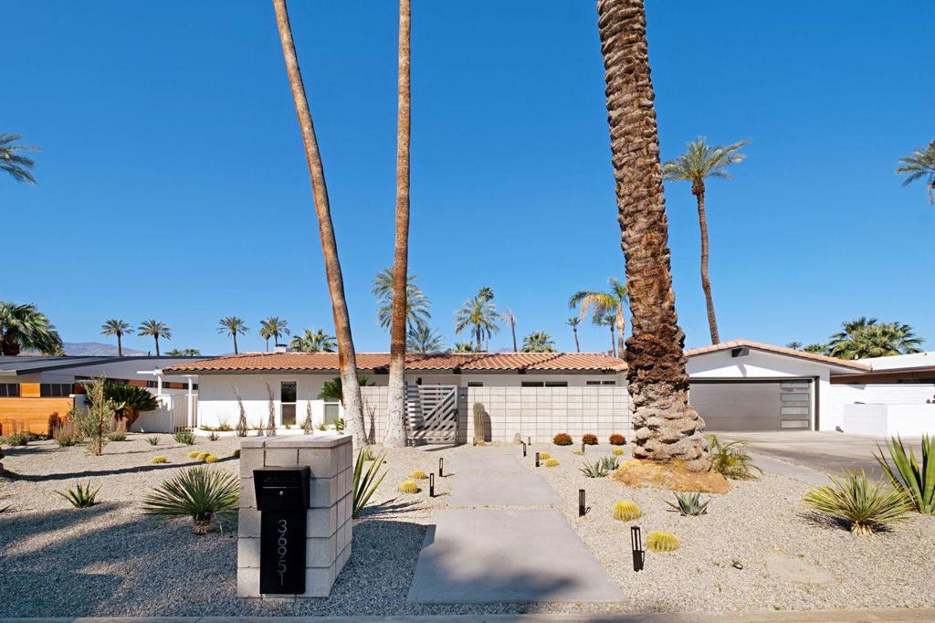 Nestled within the illustrious enclave of TAMARISK HEIGHTS in Rancho Mirage, this MID-CENTURY modern masterpiece stands as a testament to luxury living. Boasting four spacious bedrooms and adorned with unparalleled amenities, this residence epitomizes the epitome of desert opulence.Upon entering, guests are greeted by the sheer grandeur of the meticulously designed interiors. Quartz countertops gleam under the warm desert sun, complementing the sleek lines and minimalist aesthetic characteristic of Mid-Century modern architecture. The chef's kitchen, a focal point of the home, beckons culinary enthusiasts with its state-of-the-art appliances and expansive layout.Entertainment knows no bounds in this haven of sophistication. A spectacular fire pit invites evenings of cozy gatherings under the starlit sky, while the shimmering pool offers respite from the desert heat. Each corner of this abode exudes an aura of elegance and tranquility, inviting residents to unwind and indulge in the finer things in life.Every detail of this residence has been meticulously curated, down to the furnishings themselves. Designed by a renowned interior designer, the home is presented turnkey furnished, ensuring a seamless transition into a lifestyle of luxury and comfort.Situated in RANCHO MIRAGE, often referred to as the ''Playground of the Presidents,'' this property embodies the epitome of prestige and exclusivity. Long term lease (12 Mo). or minimum of 5 month lease for $12,000/month OR BEST OFFER!!!