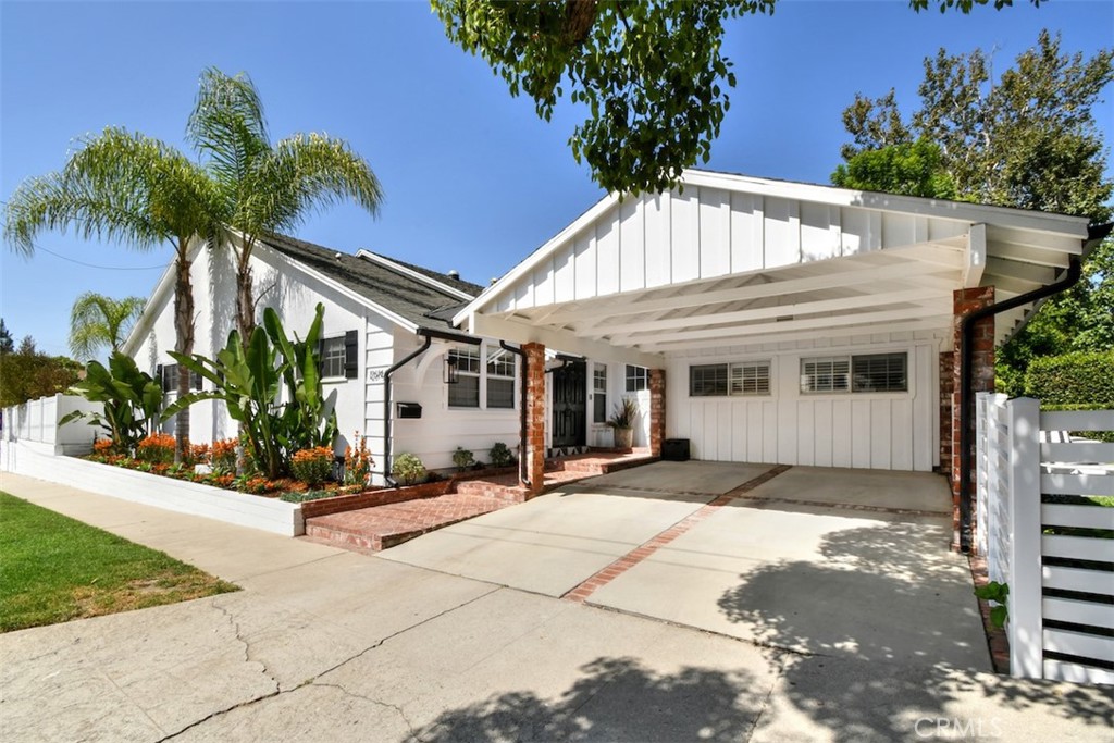 Welcome to Your Dream Home in Prime Valley Village!
Tucked away on a quiet cul-de-sac, this exceptional 4-bedroom, 3-bathroom residence offers the perfect blend of comfort, style, and functionality. The double doors open to a formal entry with freshly refinished flooring, recessed lighting, and an open, inviting floor plan designed for modern living and effortless entertaining.
The spacious living room features high-beamed ceilings, a cozy fireplace, and sliding doors that open to a private backyard oasis—complete with a classic kidney-shaped pool, charming cabana, brick patio, and new perimeter fencing. Whether you’re hosting guests or unwinding at the end of the day, this space is pure California living.
At the heart of the home is a chef’s dream kitchen, fully remodeled with top-of-the-line Viking appliances: convection and separate standard oven, warming drawer, 5 burner stove, french door refrigerator. Plus, Bosch dishwasher, quartz countertops, a farm sink, custom cabinetry, and a bright garden window. Thoughtful details like a coffee nook, mini subway tile backsplash, and hidden storage solutions make this space both fabulous and functional.
The flexible floorplan includes 4 generously sized bedrooms, with the potential for a 5th in the oversized family room (which includes a closet). The serene primary suite features dual closets, pool access, and a spa-inspired en-suite bath with double sinks and a beautifully tiled shower. Two additional bedrooms share a stylishly updated full bathroom, while a fourth bedroom near the front of the house—ideal for a home office or playroom—has access to its own remodeled ¾ bath.
Step outside from the light-filled family room to enclosed, grassy yard and tiled patio surrounded by mature trees and lush landscaping—perfect for relaxing, playing, or entertaining.
Additional highlights include:
New top-of-the-line, energy-efficient central air and heating
Whole-home salt-free water filtration (LifeSource)
New insulation throughout
Double-paned windows with custom shutters and window treatments
Updated pool pump and security system
Newer gutters and a convenient dog run
Located within easy reach of the Westside, downtown LA, top-rated public and private schools, and vibrant shopping and dining—this is more than a home, it’s a lifestyle upgrade. The pride of ownership is evident in every thoughtful detail.
This home is a 10+ and will not last!
