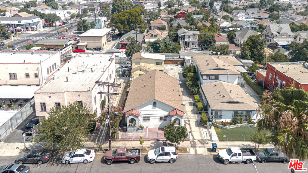 This centrally located 3-unit property in Los Angeles offers a great rental opportunity. The two front units feature 2 bedrooms and 2 bathrooms, with one unit having laminated flooring and upgraded finishes. The third unit is a 2-story layout with 3 bedrooms and 2 bathrooms. The property sits on a spacious 7,554 sq. ft. lot with ample parking available. All tenants have been consistently reliable with their rent payments.