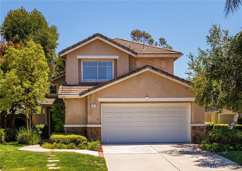 This charming two-story home is tucked away at the end of a peaceful cul-de-sac in the heart of Foothill Ranch. It features three upstairs bedrooms and two full bathrooms, with beautiful new carpeting throughout the upper level and stairs. Upon entry, you’re welcomed into a cozy family room with a gas fireplace with ceramic logs, and a large sliding window overlooking the yard. Enjoy meals in the formal dining room, complete with a chandelier and sliding glass doors that opens to the backyard. The kitchen is well-appointed with quartz countertops, a stylish tile backsplash, brand-new stainless steel Whirlpool microwave, and a stainless steel refrigerator with a water line. The primary suite includes a combined bath/shower and a spacious walk-in closet. Downstairs floors are covered in durable ceramic tile with a wood-look finish—ideal for kids or pets thanks to its easy maintenance. The laundry area is located in the garage, and the washer and dryer are included for the next owner’s convenience. The home boasts a two-and-a-half-car garage with direct access to both the house and the backyard—perfect for storing bikes, toys, or other gear. Set in a friendly neighborhood where neighbors are ready to welcome you, this home is close to Foothill Ranch Towne Center, Whiting Ranch Wilderness Park, and a resort-style community center with a pool, spa, and clubhouse. With easy access to the 241 Freeway and just 20 minutes from John Wayne Airport, this home offers both comfort and convenience.