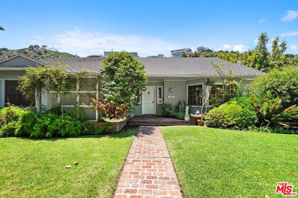 .Welcome to 11782 Bellagio Rd, a 3-bedroom, 2.5-bath home with great bones and so much potential, located near the exclusive Moraga Estates gated community in one of LA's most desirable neighborhoods. This is a rare opportunity to expand or remodel a classic home to suit your style and needs. The layout is spacious and inviting, featuring a large family room that flows into the living room and kitchen, perfect for entertaining or everyday living. The backyard is private and expansive, with room for a pool and plenty of space to enjoy that indoor-outdoor California lifestyle. You'll find great storage throughout, both inside and out, along with a flexible floor plan that can grow with you. Ideally situated near Brentwood, the Skirball Cultural Center, the Getty, and UCLA, this home offers incredible access to everything the Westside has to offer. Whether you're ready to roll up your sleeves or bring your designer, 11782 Bellagio is full of opportunity in a location you can't beat. The two fireplaces in the living room & the primary bedroom are not functional. Extra multi-purpose bonus room behind the garage.