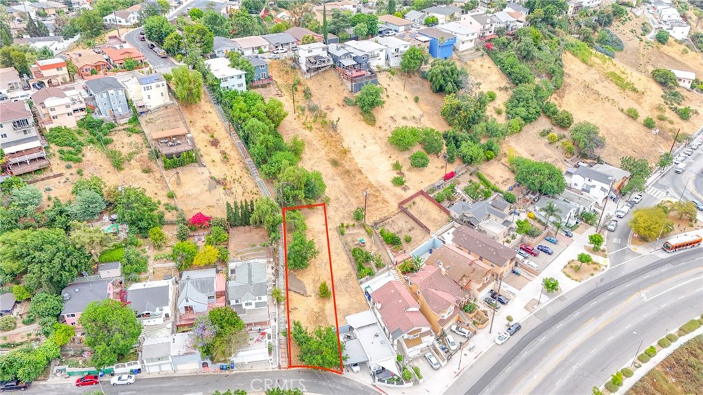 Opportunity knocks in the heart of El Sereno!
This vacant lot offers 3,918 sq ft of land with LAR1 zoning, presenting the potential to build a single-family residence with an ADU (buyer to verify). Located in a well-established Los Angeles neighborhood, the parcel is not in a flood zone and enjoys easy access to the 10, 710, and 5 freeways, making it highly desirable for future development.
With low property taxes and no structures to remove, this is a low-carry investment ideal for developers, owner-builders, or investors looking to build or hold in an appreciating market. Utilities are nearby (buyer to verify), and the property falls within the Los Angeles Unified School District and LA Community College District, enhancing both resale and rental potential.
Just minutes from Downtown LA, USC Medical Center, Cal State LA, and Lincoln Heights, the location offers a strategic mix of accessibility and long-term value. Perfect opportunity to build, invest, or land-bank in a central and growing area.
Buyer to verify all zoning, usage, and development potential with the City of Los Angeles. Photos coming soon! In the meantime, contact the listing agent for a preview and full details.