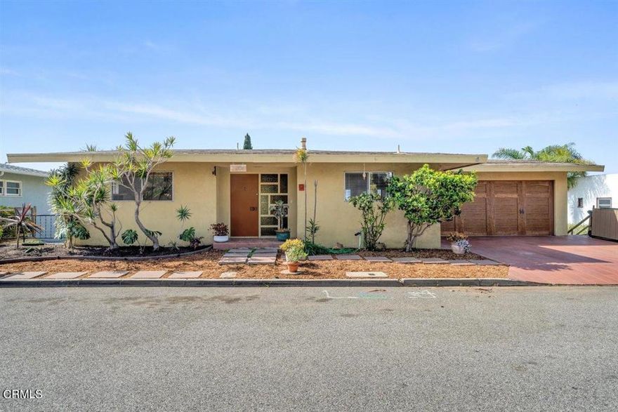 Classic ocean, island & city view as only seen from the hillside above Ventura!  Perched high above Ventura HS with a fabulous vista of all 3 sports fields adds a special bonus! 180 degree view from Living Room & upper level deck, both of which run the length of the home!  2 bedrooms plus den & gigantic bonus room downstairs.  Pantry & laundry room with gas & 220 also located on the lower level.  Handy laundry chute from upper level to laundry room. Wood-burning, raised hearth fireplaces in both the living room & den. Two semi-finished rooms below the garage are accessible from the spacious full-length patio.  Ideal for man cave, workshop, studio or??  Generous, fully-fenced yard offers endless possibilities!!  Convenient exterior staircase. A true diamond-in-the rough opportunity!!