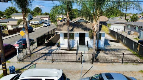 Photo of 1115 S Acacia AVE, Compton, CA 90220 (MLS # DW26176723)