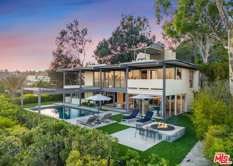 Photo of 9892 Beverly Grove Dr Dr, Beverly Hills, CA 90210 (MLS # 25594405)