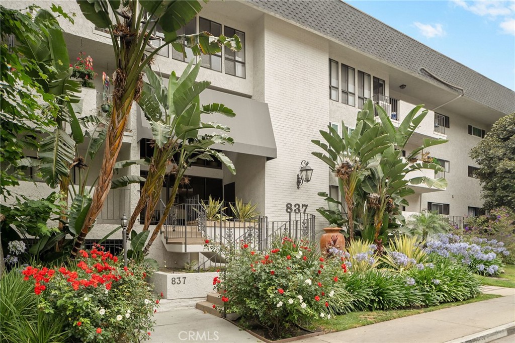 Amazing location close to shopping, restaurants and the farmers market on Melrose Place. Highly upgraded, large and peaceful condo on the top level with no one above. Southern exposure allows beautiful light to fill the space. The second story loft has the bedroom, full bath and private patio with a view of the Hollywood Hills. Downstairs can sleep a second person and still have room Huge closet, new dual pane windows, air conditioning and in unit washer and dryer. Can be completely furnished at a higher price or not, tenants choice. Comes with one garage parking space with option of a second. Building has elevator, pool and spa and BBQ area. Available for 12 month lease or shorter term.