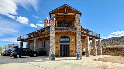 Photo of 275 Canyon Rd, Pinon Hills, CA 92371 (MLS # HD25271100)