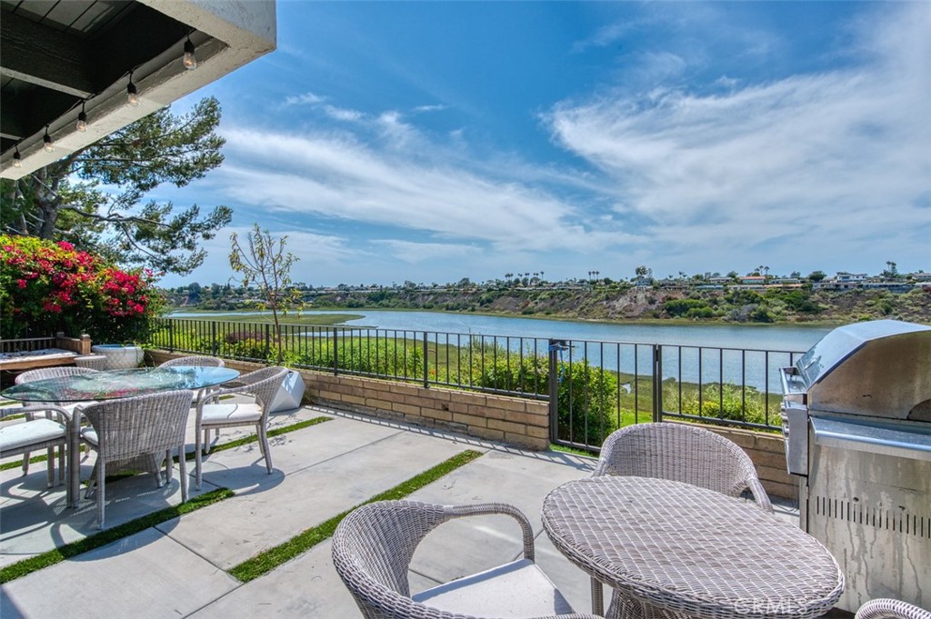 Welcome to 2139 Vista Entrada, an exquisite contemporary townhome that redefines beachfront living in Newport Beach. Boasting three bedrooms and two and a half bathrooms, this fully remodeled gem sits gracefully atop the Back Bay Bluff edge, offering panoramic water views of the picturesque Upper Newport Bay.
Step inside and experience a seamless fusion of modern design and natural charm. Expansive dual pane windows and Fleetwood glass sliding doors flood the interior with an abundance of natural light. The space is thoughtfully adorned with smooth-coated walls, recessed lighting, and pristine quartz countertops, complemented by custom shaker cabinets.
The downstairs entertainment level presents a chef's kitchen which features a large quartz countertop-covered island and top-of-the-line Wolf and Bosch stainless steel appliances. The living room opens harmoniously onto a generous outdoor patio, where you can revel in the breathtaking sights of the bay and its dynamic wildlife. Entertain on the sunlit lounging area, as you watch kayakers and paddle boarders explore the bay with sea birds and diving pelicans.
Retreat to the second floor, where all bedrooms are thoughtfully positioned to provide both privacy and stellar water views.
2139 Vista Estrada is situated between the esteemed Eastbluff Elementary School and Corona Del Mar Middle and High School. The home provides easy access to Eastbluff Village Shopping Center and upscale Fashion Island, John Wayne Airport, and the bustling Harbor.
This is your opportunity to embrace the contemporary beach lifestyle that Newport Beach is renowned for, whether you seek a serene retreat or an entertainer's paradise.